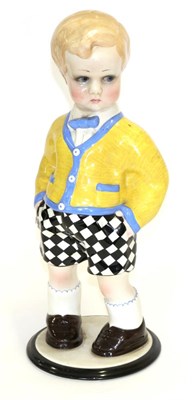 Lot 535 - A Lenci Polychrome Pottery Figure of a Boy, designed by Sandro Vacchetti, wearing a yellow and blue