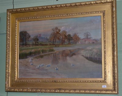 Lot 49 - Fred Sherwood (Ex. 1886-1900) ducks swimming in a pond before a village at sunset, signed, oil...