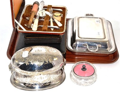 Lot 53 - A plated two division tea caddy, entree dish, cased plated flatware, silver bladed knife and...