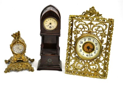 Lot 57 - A strut timepiece and two mantel timepieces