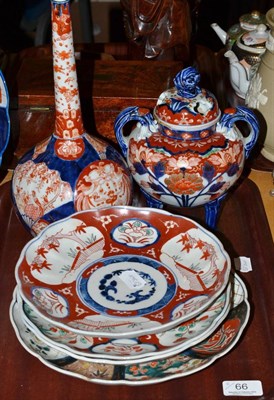 Lot 66 - Early 20th century Japanese Imari censer, an Imari vase, four plates and a charger