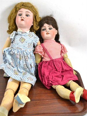 Lot 77 - Bisque socket head doll with brown wig and cotton dress and another doll (a.f.) (2)
