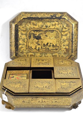 Lot 79 - Chinese black and gilt lacquered games box and cover with mother-of-pearl counters