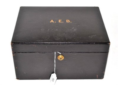 Lot 90 - Drew & Sons Piccadilly Circus London black leather vanity case with purple velvet lining,...