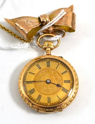 Lot 105 - A lady's enamel fob watch, case stamped '14K', with attached 9ct gold bow brooch