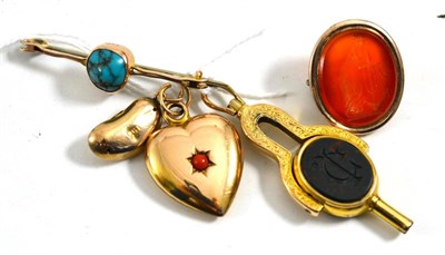 Lot 118 - A bloodstone watch key pendant, a cornelian seal brooch, two pendants and a turquoise brooch (5)