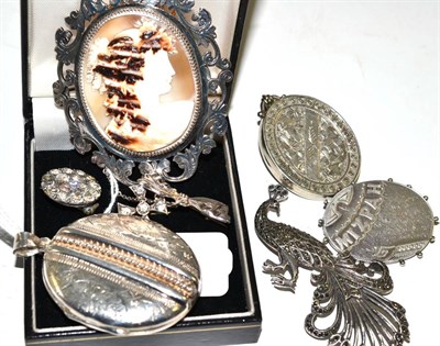 Lot 125 - A silver mounted cameo brooch by Charles Horner, two lockets, assorted brooches