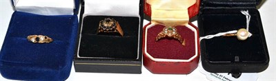 Lot 140 - Three 9ct gold stone set dress rings and another (4)