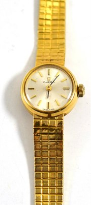 Lot 144 - A lady's 9ct gold wristwatch signed Omega