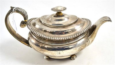Lot 155 - A Georgian silver teapot and cover, probably York, circa 1820