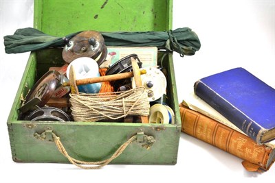 Lot 173 - A collection of assorted fishing books and reels