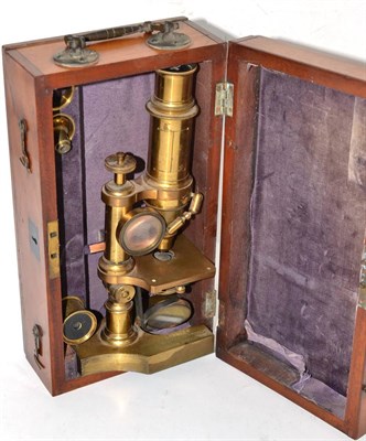 Lot 175 - Victorian brass monocular microscope by Stanley, cased with accessories