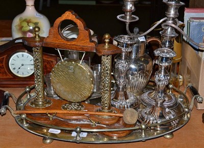 Lot 199 - Oval plated gallery tray, oak table gong with brass mounts, decanter set on plated stand,...