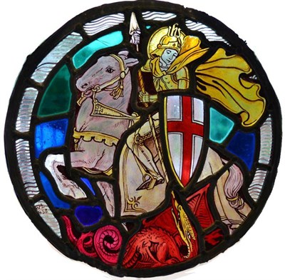 Lot 555 - A 20th Century Stained and Leaded Glass Roundel, depicting St George and the Dragon,...