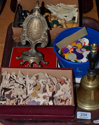 Lot 204 - Chess set, wooden jigsaw, gaming counters, brass bell, brass heraldic style wall mount, red...