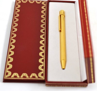 Lot 252 - A Must De Cartier pen, cased and with booklets