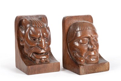 Lot 561 - A Pair of Robert  "Mouseman " Thompson Carved Oak Bookends, one carved with the head of a...