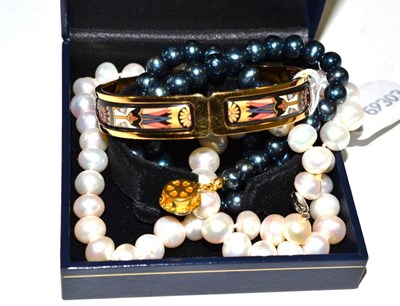 Lot 287 - A bangle by Michaela Frey and two strands of cultured pearls