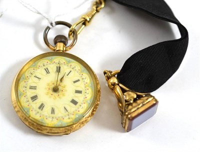 Lot 294 - A lady's fob watch stamped '18K' with attached fob seal