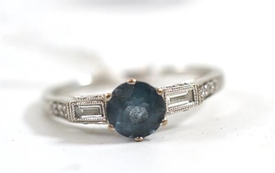 Lot 300 - A blue topaz and diamond set ring, stamped '18K'