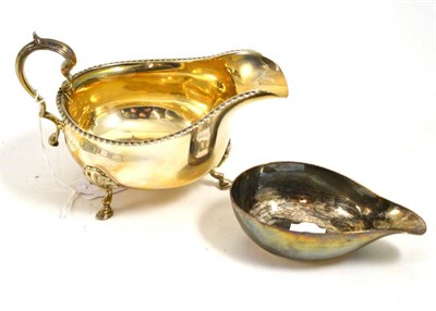 Lot 314 - Silver sauce boat and a Georgian silver pap boat (2)