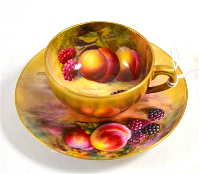 Lot 315 - Royal Worcester miniature cup and saucer painted with fruit, signed Townsend