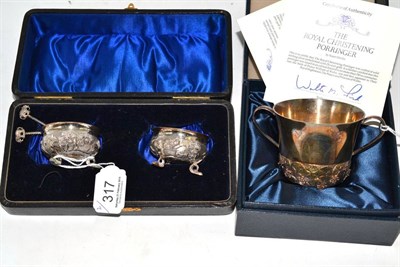 Lot 317 - Franklin Mint commemorative silver Christening mug and a pair of Indian salts with spoons, both...