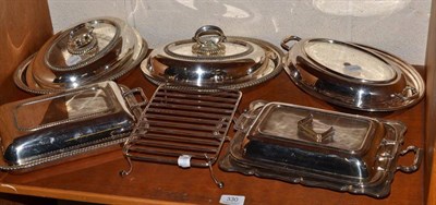 Lot 330 - Five plated entree dishes, a serving dish and rack and a small silver cup