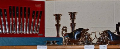 Lot 338 - A collection of silver plated items including two sauce boats, canteen of flatware, three piece tea