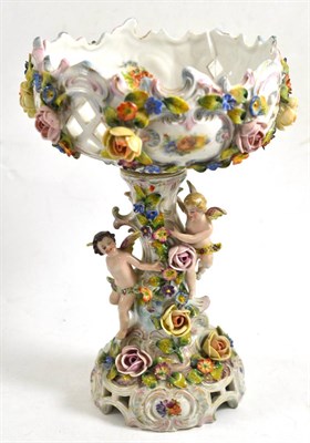 Lot 357 - Continental figural centrepiece decorated with cherubs and floral motifs