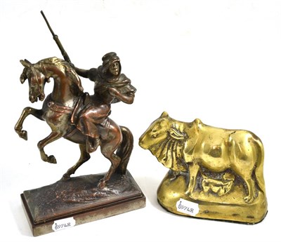 Lot 366 - After Paul Hertzel, Arab on a rearing horse and a brass figure of an Indian suckling cow, a malacca