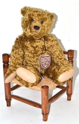 Lot 367 - Reproduction oak dolls corner chair with rush seat and a modern Mr Bear Collectors bear (2)