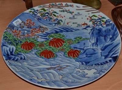 Lot 370 - Japanese Imari charger, decorated with fish, boats, carp pots, cranes