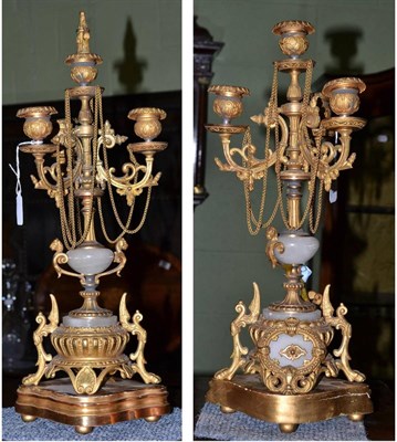 Lot 373 - Pair of gilt metal mounted candelabrum on gilt wood bases