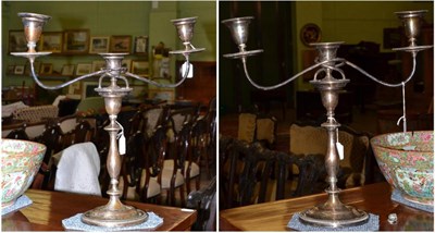 Lot 377 - A pair of Sheffield plate candelabra