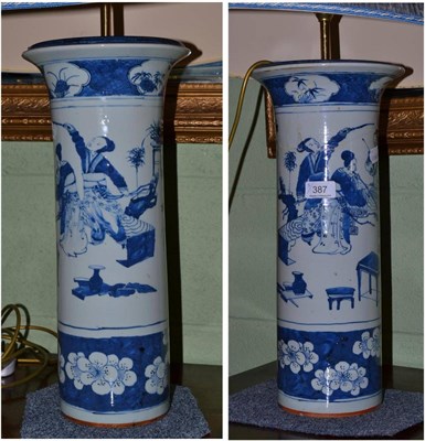 Lot 387 - Pair of Chinese blue and white tall flared vases as lamps with shades