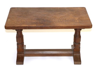 Lot 575 - A Robert  "Mouseman " Thompson Oak 2ft 5in Coffee Table, the rectangular top on two octagonal...