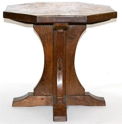 Lot 576 - A Robert  "Mouseman " Thompson Oak Octagonal Coffee Table, on a cruciform base, with carved...