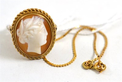 Lot 407 - A 9ct gold cameo ring and chain