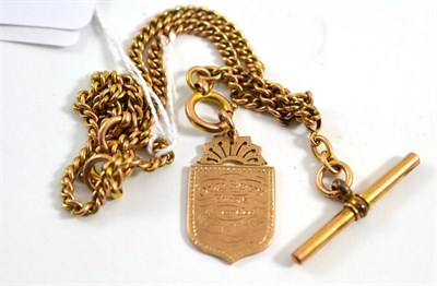 Lot 435 - An Albert chain with fob