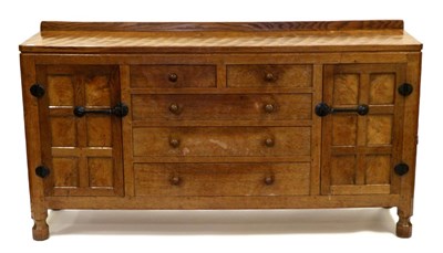 Lot 580 - A Robert  "Mouseman " Thompson Panelled Oak Sideboard, with raised upstand, adzed all over,...