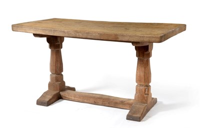 Lot 581 - A Robert  "Mouseman " Thompson Scrubbed Oak 4ft6in Table, the single plank top on two...