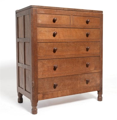 Lot 584 - A Robert  "Mouseman " Thompson Oak Chest of Drawers, with raised upstand above two short over...