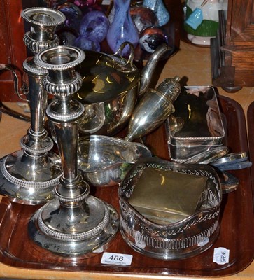 Lot 486 - A silver sauce boat, silver ashtray, cigarette box, three silver frames, silver sugar caster,...