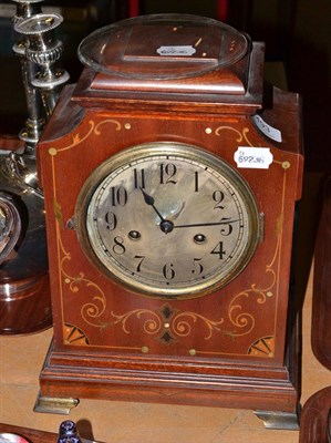 Lot 493 - An Edwardian inlaid mantel clock