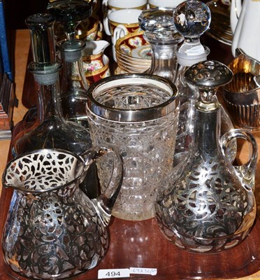 Lot 494 - Two smokey glass decanters and stoppers, silver mounted cut glass vase, a glass jug, decanter...