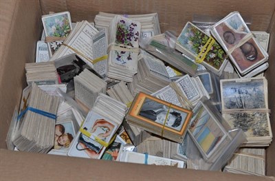 Lot 497 - Large accumulation of cigarette cards, some in penny albums