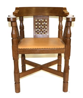 Lot 586 - A Robert  "Mouseman " Thompson Oak Monk's Chair, with curved back and shaped arms, over three...