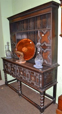 Lot 525 - Circa 1930's dark oak dresser and rack