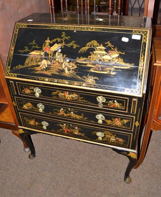 Lot 545 - Circa 1920's black lacquer bureau with chinoiserie decoration